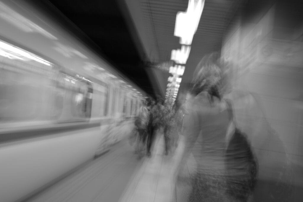 View of a subway platform with motion blur.