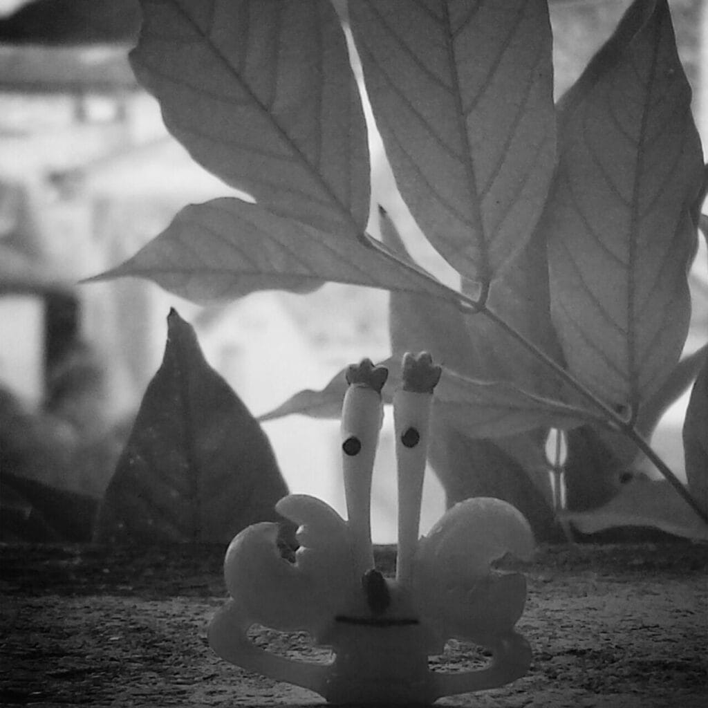 Crab-shaped toy on the edge of a balcony.