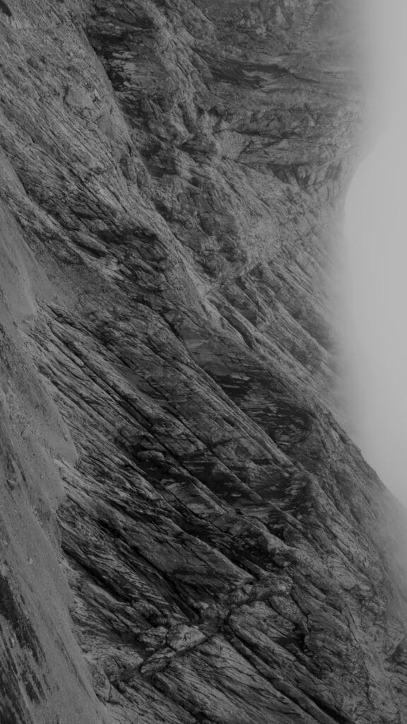 Mineral mountain landscape: stony slopes and scree.