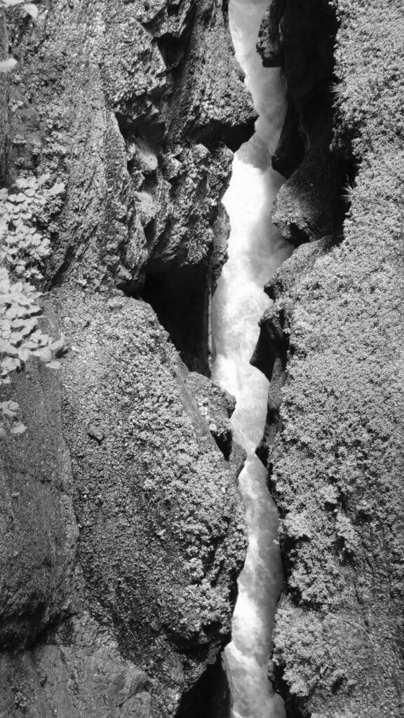 A raging river in a rift, seen from above.