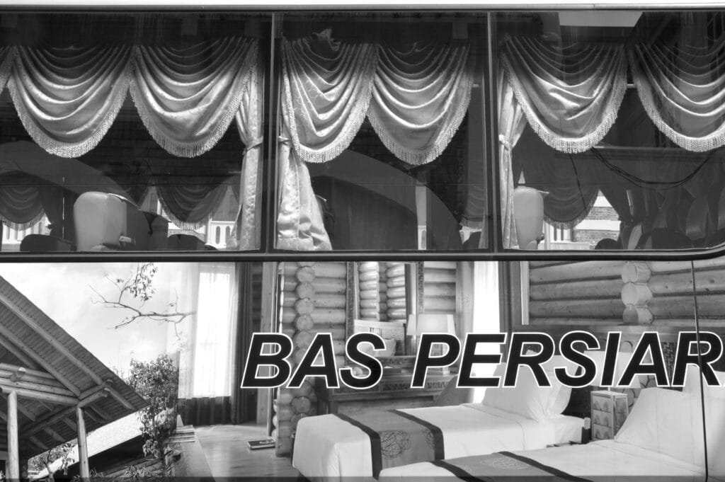 Bus with curtained windows, decorated with an advertisement for a resort.