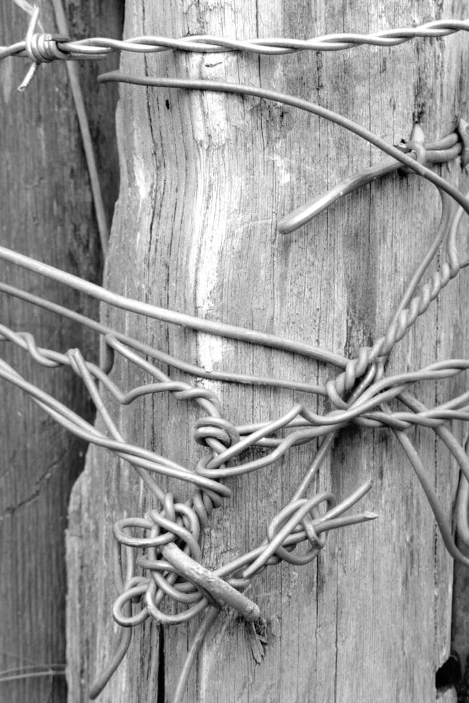 Wires mess nonsense on a post.