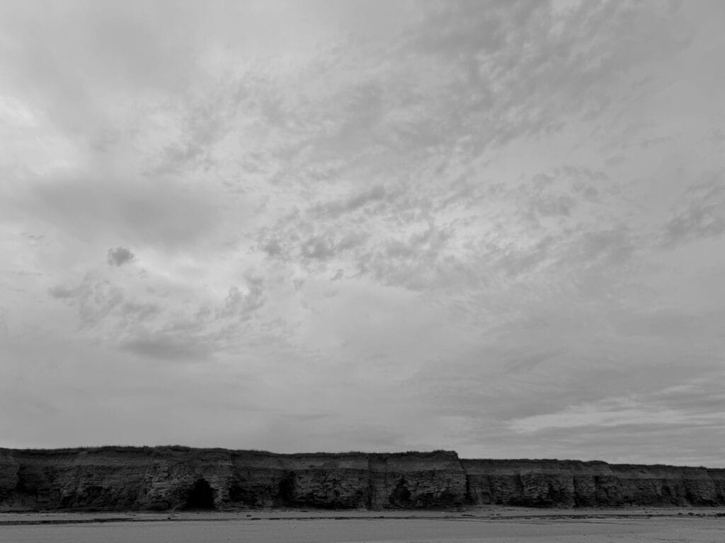 Beach, cliffs, sky. That’s all folks.