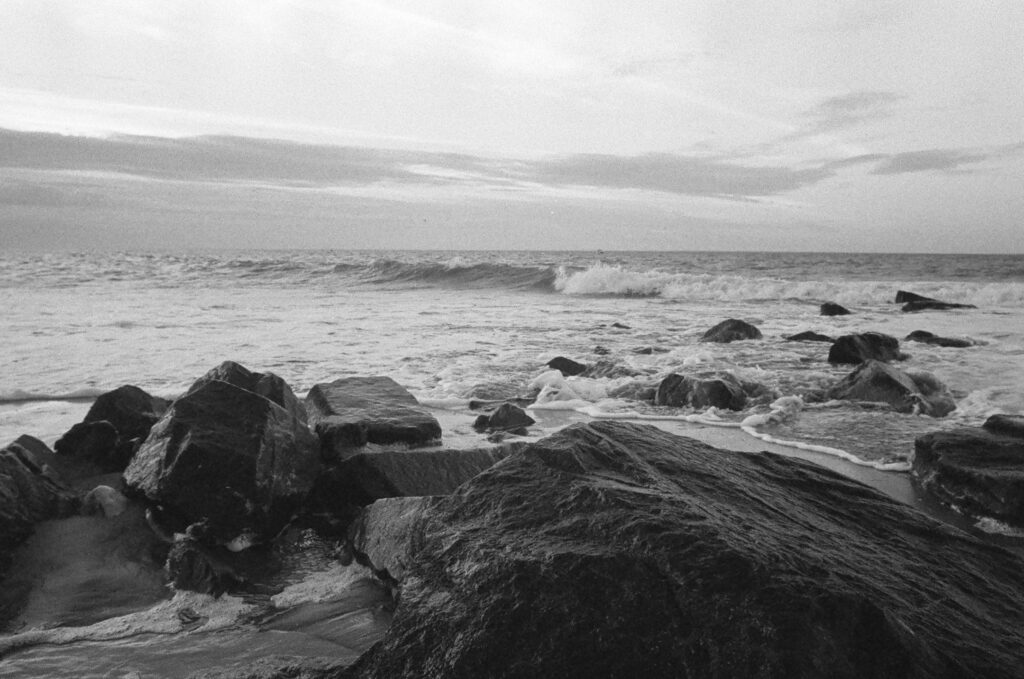 The sea as seen from the rocks on the beach.