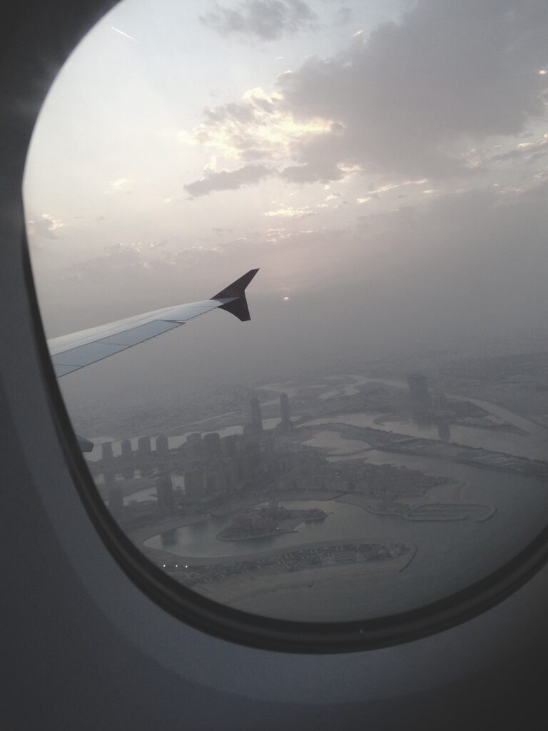 Doha seen through an airplane window.